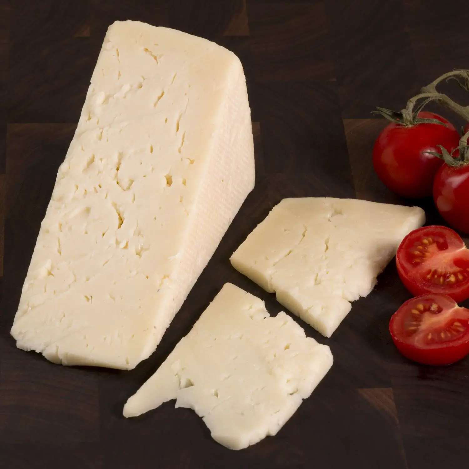 Asiago Pressato is a cheese that is produced in the Veneto Region of ...