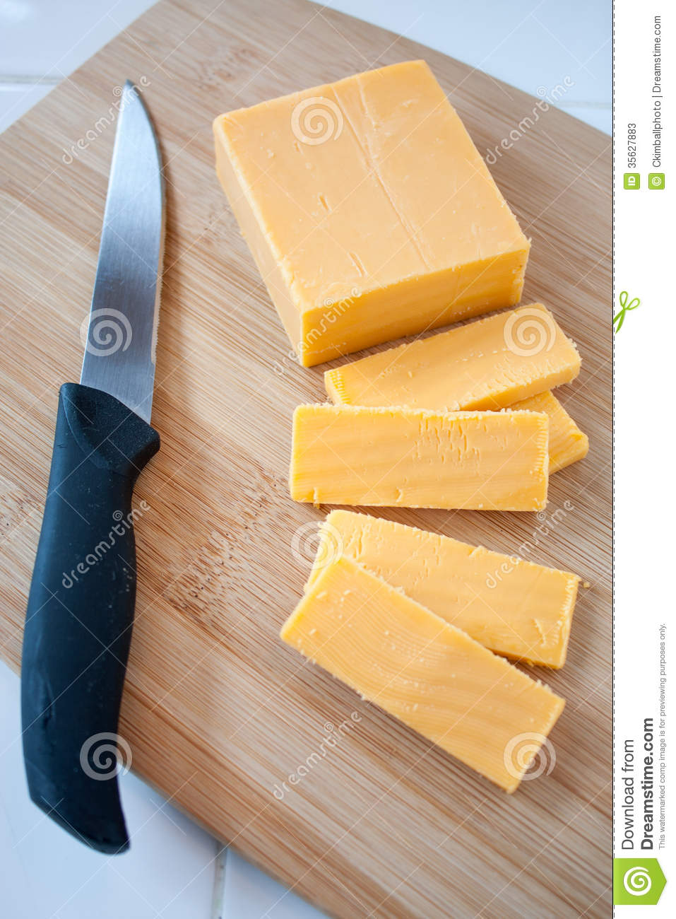 Cheddar Cheese Block And Slices Stock Image