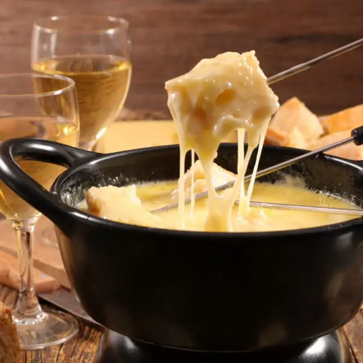 Cheese fondue: melty cheese dip turns food to gold