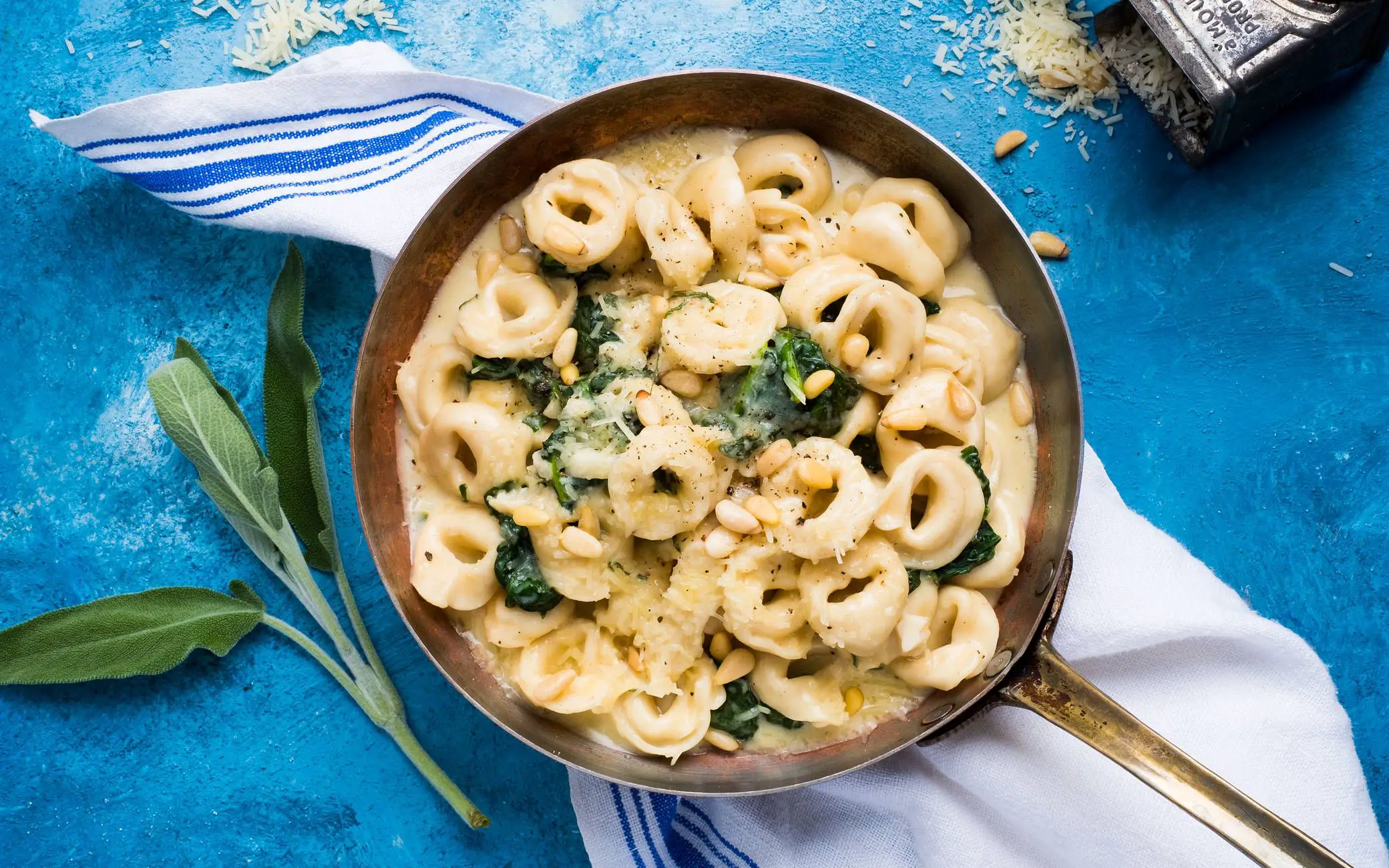 Creamy &  Cheesy Tortellini Sprinkled with Pine Nuts