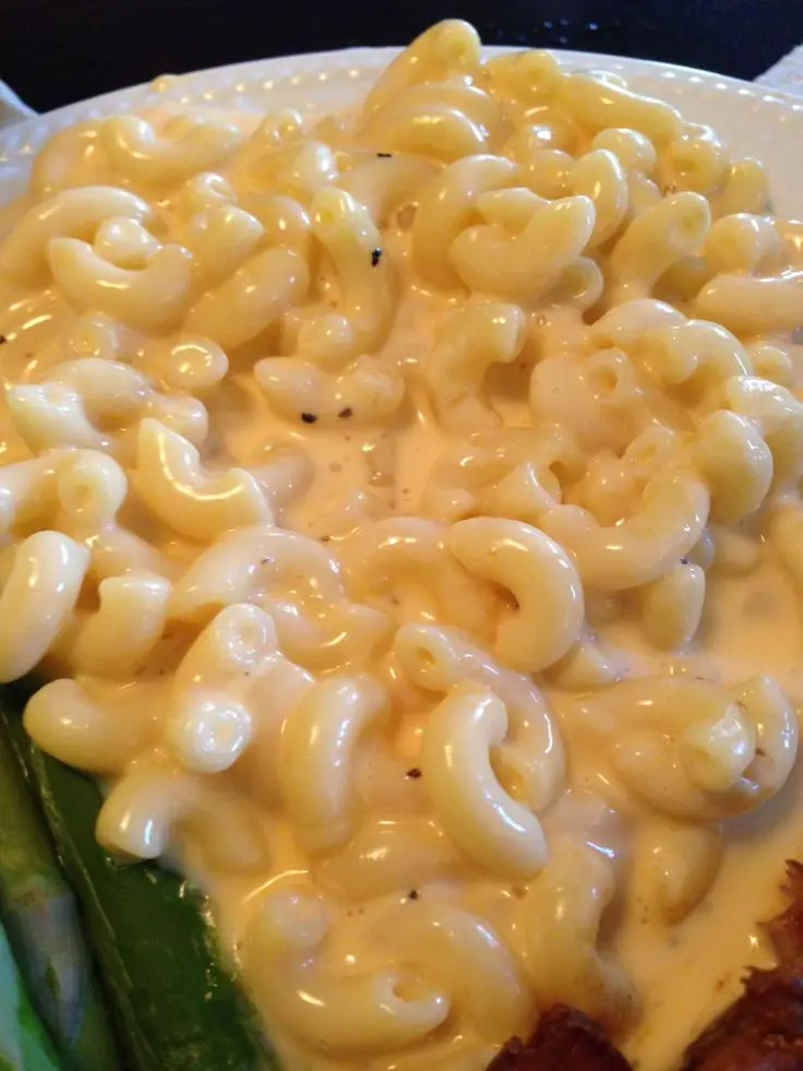 Mac and Cheese three cups of raw elbow macaroni half of stick of butter ...